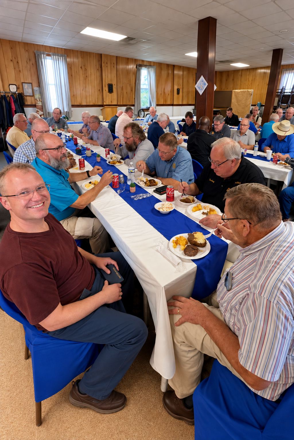 King Lodge members talking over dinner at long tables